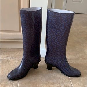 Rain boots tall rubber rarely used.